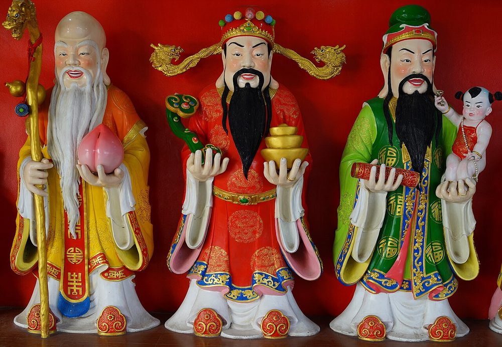 Statues of the three star gods at a Chinese temple in Bangkok