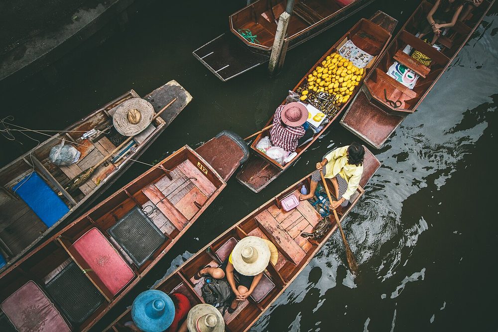 Boats loaded with goods at Damnoen Saduak floating market